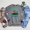 Unearth A Story At The Library Dinosaur Reading Raglan Sleeve Sweatshirt Deep Heather