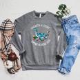 Unearth A Story Summer Reading 2026 Cute Plesiosaurus Book Raglan Sleeve Sweatshirt Deep Heather