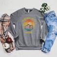 Vintage January 1972 Dark Academia Skull On Books Distressed Raglan Sleeve Sweatshirt Deep Heather Vintage January 1972 Dark Academia Skull On Books Distressed Raglan Sleeve Sweatshirt Deep Heather