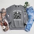 Weird Teachers Build Character Skeleton Reading Book Raglan Sleeve Sweatshirt Deep Heather