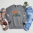 Wild About Reading Library Day Reading Books And Bookworm Raglan Sleeve Sweatshirt Deep Heather