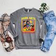 Women's Dark Arts And Crafts Club Retro Witchy Book Cover Raglan Sleeve Sweatshirt Deep Heather Women's Dark Arts And Crafts Club Retro Witchy Book Cover Raglan Sleeve Sweatshirt Deep Heather