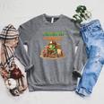 Women's Unearth a Story Summer 2026 Dinosaur Reading Books Dino Raglan Sleeve Sweatshirt Deep Heather Women's Unearth a Story Summer 2026 Dinosaur Reading Books Dino Raglan Sleeve Sweatshirt Deep Heather