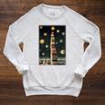 Astrologist Sitting On The Tower Of Stacked Up Books Starry Raglan Sleeve Sweatshirt Heather Mustard