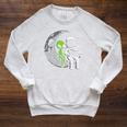 Astronaut Reading Book To Alien Moon Space Women Kids Men Premium Tri-Blend Raglan Sleeve Sweatshirt Heather Mustard