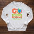 Book Reading Library Go Away Im Reading Raglan Sleeve Sweatshirt Heather Mustard Book Reading Library Go Away Im Reading Raglan Sleeve Sweatshirt Heather Mustard