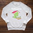 Bookasaurus T-Rex Reading Dinosaur Book Pun T Shirt Raglan Sleeve Sweatshirt Heather Mustard