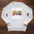 Booked Every Weekend Pun Book Lover Book Nerd Reading Premium Tri-Blend Raglan Sleeve Sweatshirt Heather Mustard