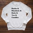 Books And Blankets And Rain And Tea And Candles Graphic Raglan Sleeve Sweatshirt Heather Mustard