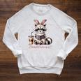 Booktrovert Raccoon Reading Book Iced Coffee Lover Raglan Sleeve Sweatshirt Heather Mustard