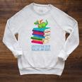 Bookworm Easily Distracted By Dragons And Books Reader Raglan Sleeve Sweatshirt Heather Mustard Bookworm Easily Distracted By Dragons And Books Reader Raglan Sleeve Sweatshirt Heather Mustard
