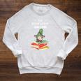 The Bookworm Gnome Christmas Gnome Book Reading Enthusiast Raglan Sleeve Sweatshirt Heather Mustard