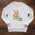 Bunny With Books And Coffee Reading Booknerd Bookish Easter Raglan Sleeve Sweatshirt Heather Mustard Bunny With Books And Coffee Reading Booknerd Bookish Easter Raglan Sleeve Sweatshirt Heather Mustard