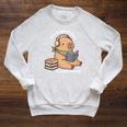 Capybara Reading a Book Cute Reading For Boys Girls Premium Tri-Blend Raglan Sleeve Sweatshirt Heather Mustard