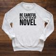 Be Careful Or I'Ll Put You In My Novel Book Author Raglan Sleeve Sweatshirt Heather Mustard
