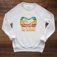 All The Cool Kids Are Reading Books Raglan Sleeve Sweatshirt Heather Mustard