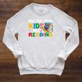 All The-Cool Kids Are Reading Teacher Book Lover Librarian Raglan Sleeve Sweatshirt Heather Mustard