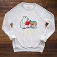 Cute Capybara It's a Good Day To Read a Book World Book Day Raglan Sleeve Sweatshirt Heather Mustard