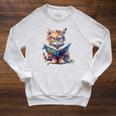 Cute Cat Wearing Glasses Reading a Book Raglan Sleeve Sweatshirt Heather Mustard Cute Cat Wearing Glasses Reading a Book Raglan Sleeve Sweatshirt Heather Mustard