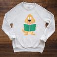Cute Dog Reading A Human Training Book Dog Raglan Sleeve Sweatshirt Heather Mustard