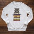 Cute Raccoon Reading On Pile Of Books Raglan Sleeve Sweatshirt Heather Mustard