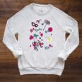 DC Comics Harley Quinn With Textbook Collage Raglan Sleeve Sweatshirt Heather Mustard DC Comics Harley Quinn With Textbook Collage Raglan Sleeve Sweatshirt Heather Mustard