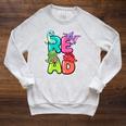 Dinosaur Read Book Lover Dino Reading Kids Premium Tri-Blend Raglan Sleeve Sweatshirt Heather Mustard