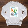 Dr Seuss ABC Book Cover Premium Tri-Blend Raglan Sleeve Sweatshirt Heather Mustard