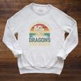 Easily Distracted By Books & Dragons Bookworm Reading Raglan Sleeve Sweatshirt Heather Mustard Easily Distracted By Books & Dragons Bookworm Reading Raglan Sleeve Sweatshirt Heather Mustard