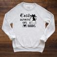 Easily Distracted Cats And Books Funny Book Lover Cat Gifts Women Raglan Sleeve Sweatshirt Heather Mustard Easily Distracted Cats And Books Funny Book Lover Cat Gifts Women Raglan Sleeve Sweatshirt Heather Mustard