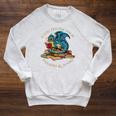 Easily Distracted By Dragons And Books Nerd Dragon Raglan Sleeve Sweatshirt Heather Mustard