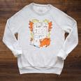 I Fall For Pumpkins Bonfires S'Mores Books Halloween Reader Raglan Sleeve Sweatshirt Heather Mustard
