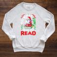 What Fun It Is To Read Books Christmas Santa Reading Books Raglan Sleeve Sweatshirt Heather Mustard