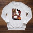 Ghost With Bookshelf Halloween Bookish Premium Tri-Blend Raglan Sleeve Sweatshirt Heather Mustard