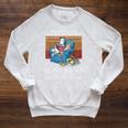 A Girl Who Loves Books Cats And Dogs Cat Book Reading Raglan Sleeve Sweatshirt Heather Mustard