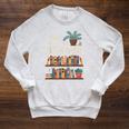 I'm With The Banned Books Reading Raglan Sleeve Sweatshirt Heather Mustard I'm With The Banned Books Reading Raglan Sleeve Sweatshirt Heather Mustard