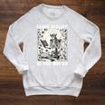 Leave Reality Enter Books Skeleton Reading Book Raglan Sleeve Sweatshirt Heather Mustard Leave Reality Enter Books Skeleton Reading Book Raglan Sleeve Sweatshirt Heather Mustard