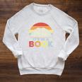 Take A Look It's In A Book Retro Reading Premium Tri-Blend Raglan Sleeve Sweatshirt Heather Mustard