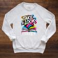 Take A Look Its In A Book Street Art Team Bookworm Librarian Raglan Sleeve Sweatshirt Heather Mustard