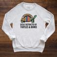 I Love Turtles Easily Distracted By Turtles And Books Nerds Raglan Sleeve Sweatshirt Heather Mustard I Love Turtles Easily Distracted By Turtles And Books Nerds Raglan Sleeve Sweatshirt Heather Mustard