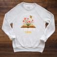 A New Chapter Begins Retired 2026 Floral Book Butterfly Tee Raglan Sleeve Sweatshirt Heather Mustard A New Chapter Begins Retired 2026 Floral Book Butterfly Tee Raglan Sleeve Sweatshirt Heather Mustard