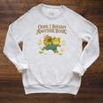Oops I Bought Another Book Frog For Bookish Readers Raglan Sleeve Sweatshirt Heather Mustard