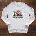 Open Book With Wildflowers Blooming Around Pages Raglan Sleeve Sweatshirt Heather Mustard Open Book With Wildflowers Blooming Around Pages Raglan Sleeve Sweatshirt Heather Mustard