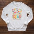 Plant A Seed Read Library Summer Reading 2026 Floral Book Raglan Sleeve Sweatshirt Heather Mustard Plant A Seed Read Library Summer Reading 2026 Floral Book Raglan Sleeve Sweatshirt Heather Mustard