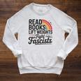 Read Books Lift Weights Fight Fascists Bookworm Book Lover Raglan Sleeve Sweatshirt Heather Mustard