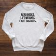 Read Books Lift Weights Fight Fascists Premium Tri-Blend Raglan Sleeve Sweatshirt Heather Mustard Read Books Lift Weights Fight Fascists Premium Tri-Blend Raglan Sleeve Sweatshirt Heather Mustard