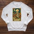 The Reader Skeleton Reading Books Tarot Card Dark Academia Raglan Sleeve Sweatshirt Heather Mustard