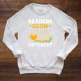 Readers Glow Different Book Lover Reading Premium Tri-Blend Raglan Sleeve Sweatshirt Heather Mustard