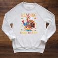 Reading Makes Me Gobble With Joy Turkey Reading Book L Raglan Sleeve Sweatshirt Heather Mustard
