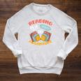Reading Is A Ticket To Adventure Book Library Themed Raglan Sleeve Sweatshirt Heather Mustard Reading Is A Ticket To Adventure Book Library Themed Raglan Sleeve Sweatshirt Heather Mustard